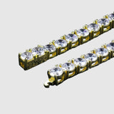 Gold chain with clear stones on a black background