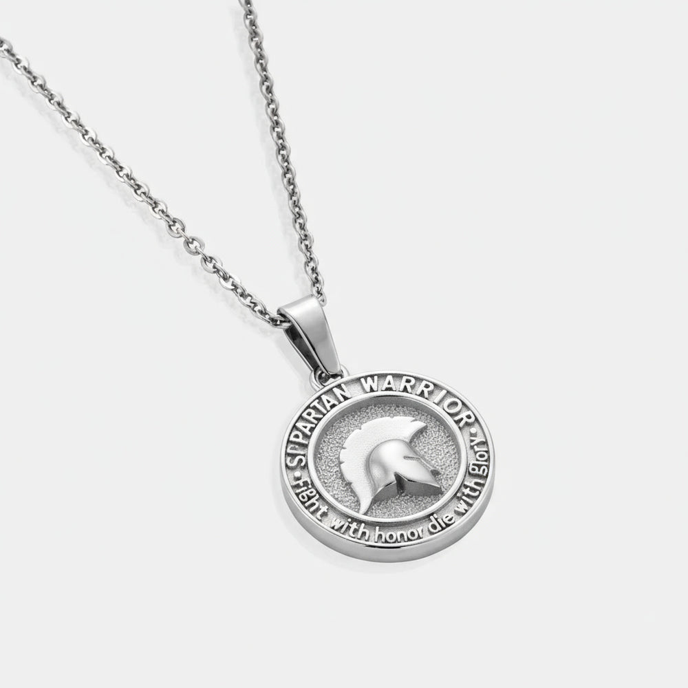 Silver pendant necklace with 'Spartan Warrior' inscription on a white background