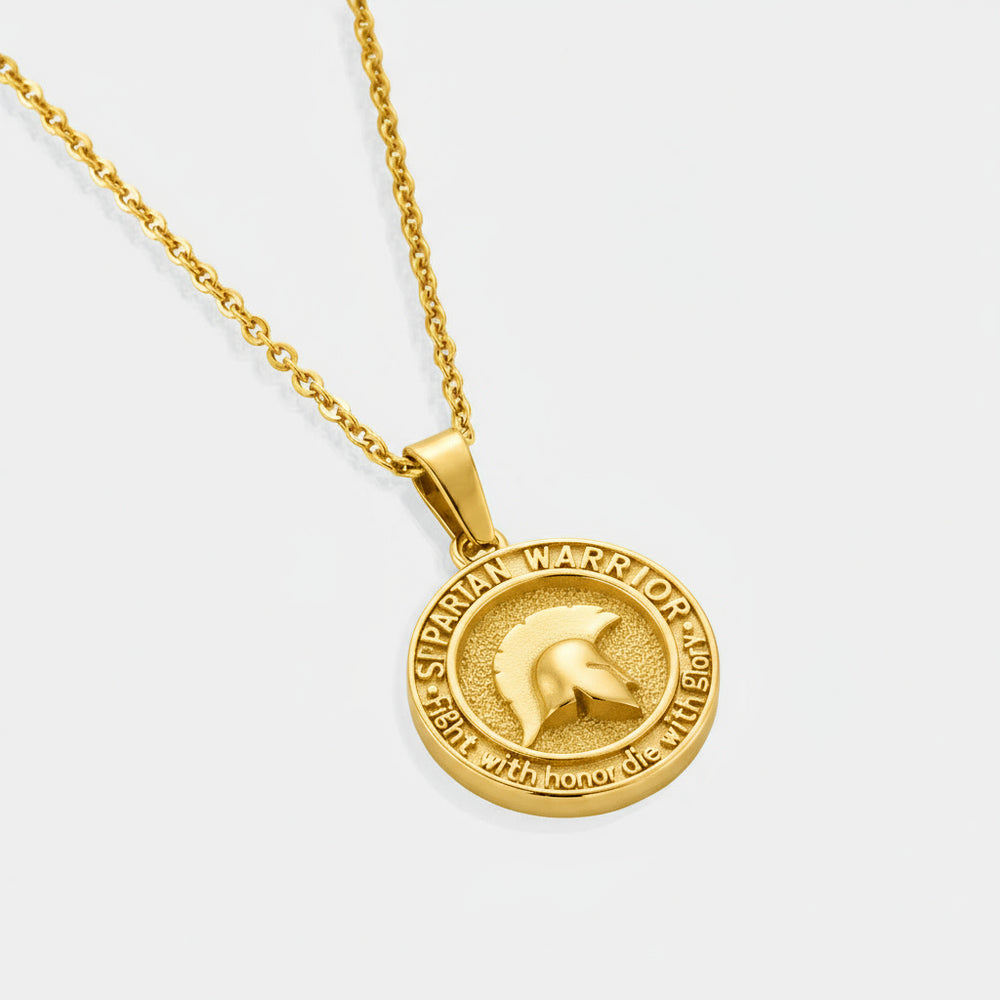 Gold necklace with a Spartan warrior pendant on a white background