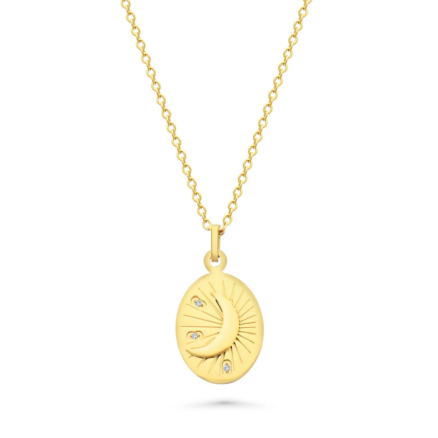 Gold necklace with a pendant featuring a moon design on a white background