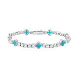 Silver bracelet with turquoise clover-shaped stones on a white background