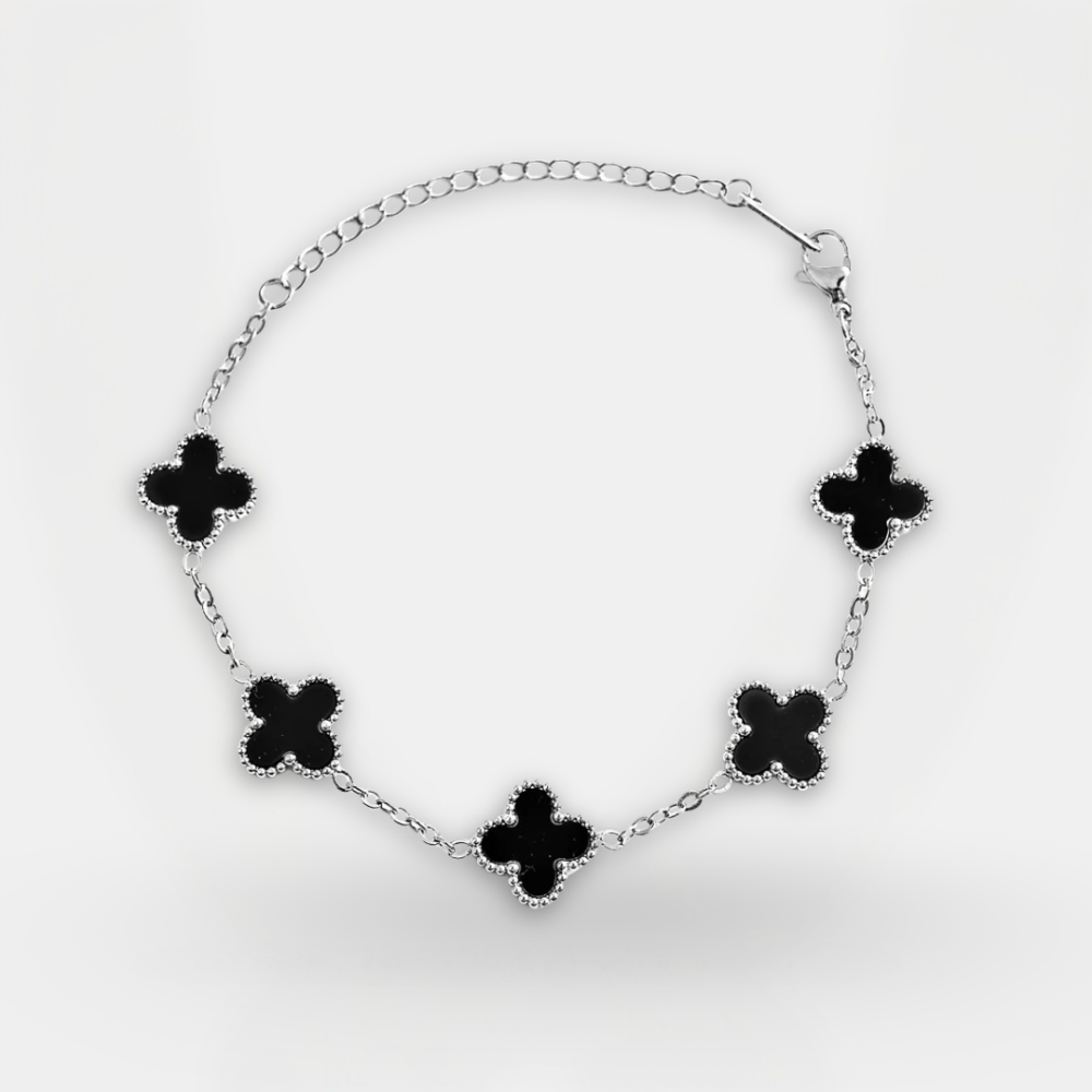 Bracelet with black flower-shaped charms on a white background