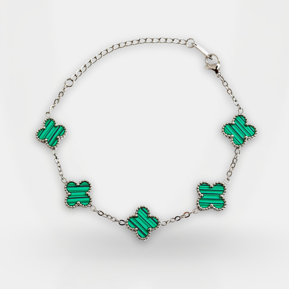 Necklace with green butterfly-shaped pendants on a white background