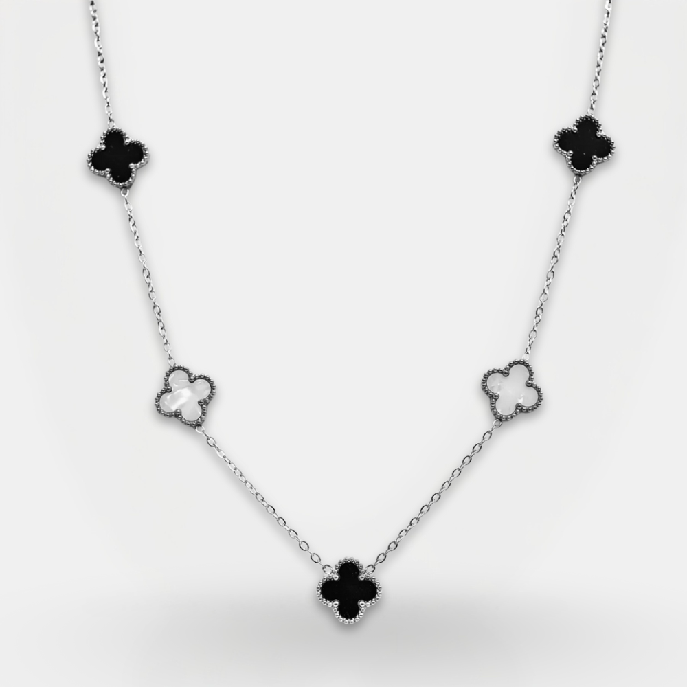 Necklace with clover-shaped pendants on a white background