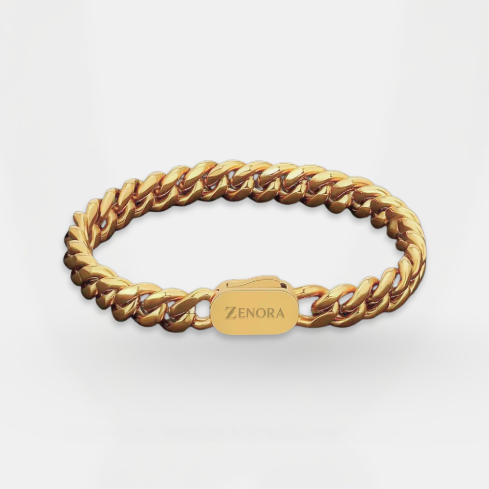 Gold chain bracelet with 'Zenora' tag on a white background