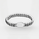 Silver chain bracelet with 'Zenora' engraving on a white background