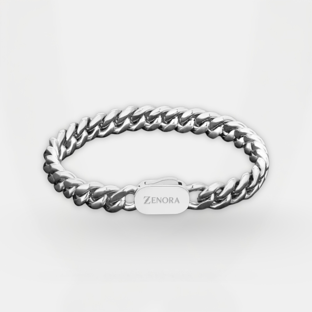Silver chain bracelet with 'Zenora' engraving on a white background