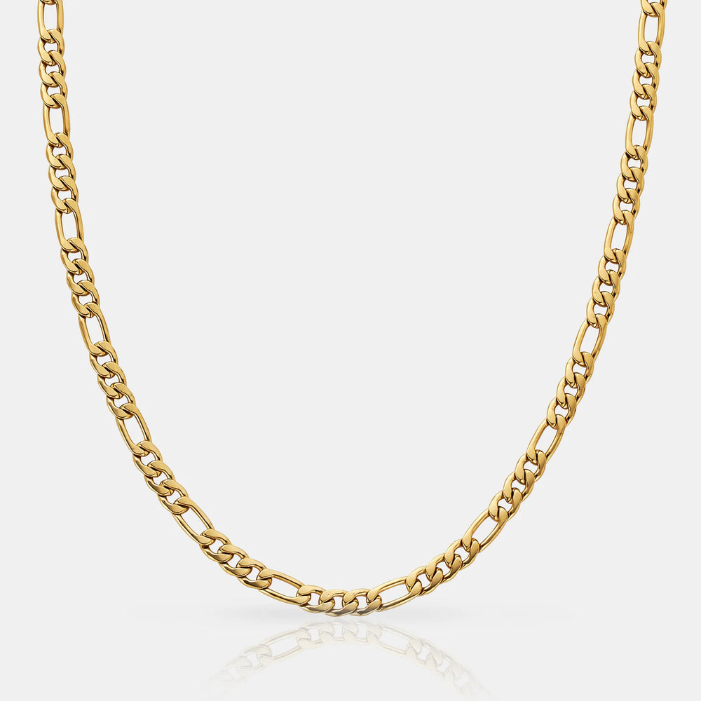 Gold chain necklace on a white background