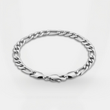 Silver chain bracelet on a light gray background