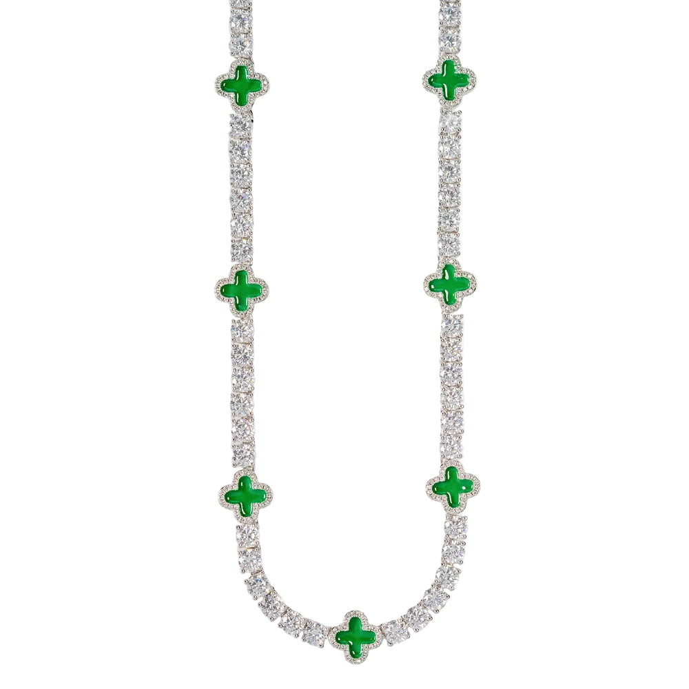Necklace with green gemstones on a white background