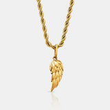 Gold necklace with a wing-shaped pendant on a white background