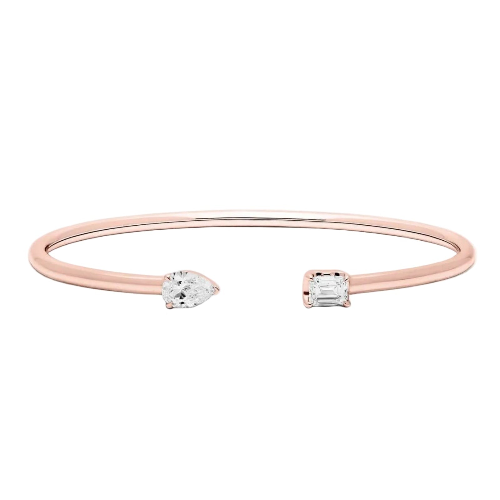 Rose gold bracelet with two clear diamonds on a white background