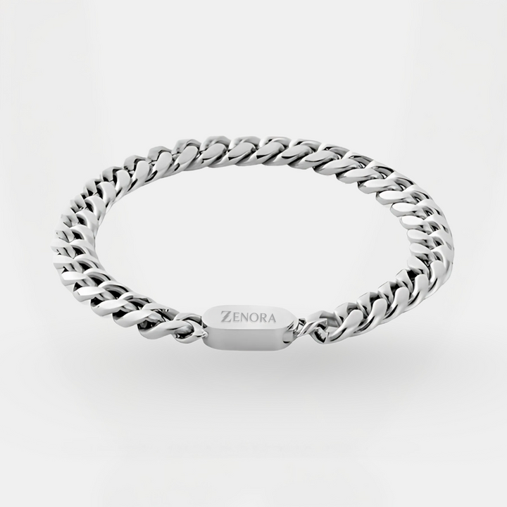Silver chain bracelet with 'Zenora' branding on a light gray background