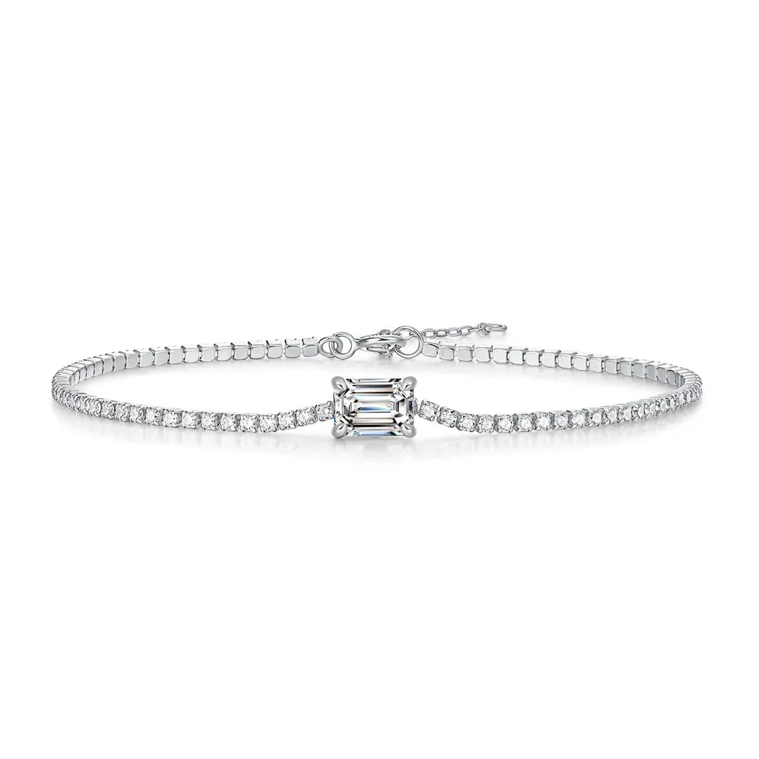 Diamond bracelet with a central emerald-cut diamond on a white background
