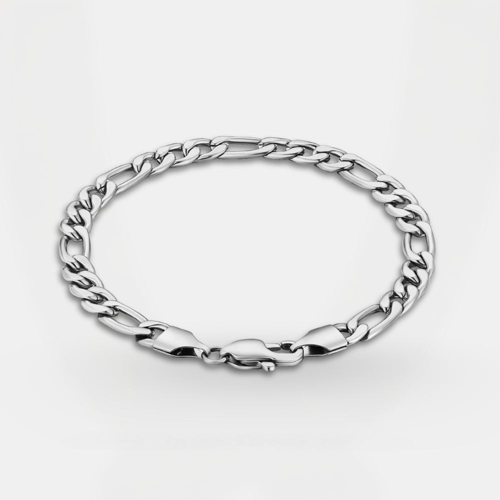 Silver chain bracelet on a light gray background