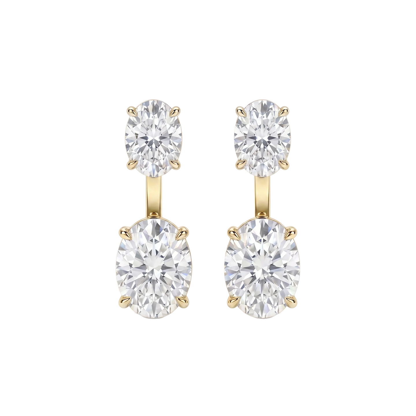 Pair of diamond earrings with gold settings on a white background