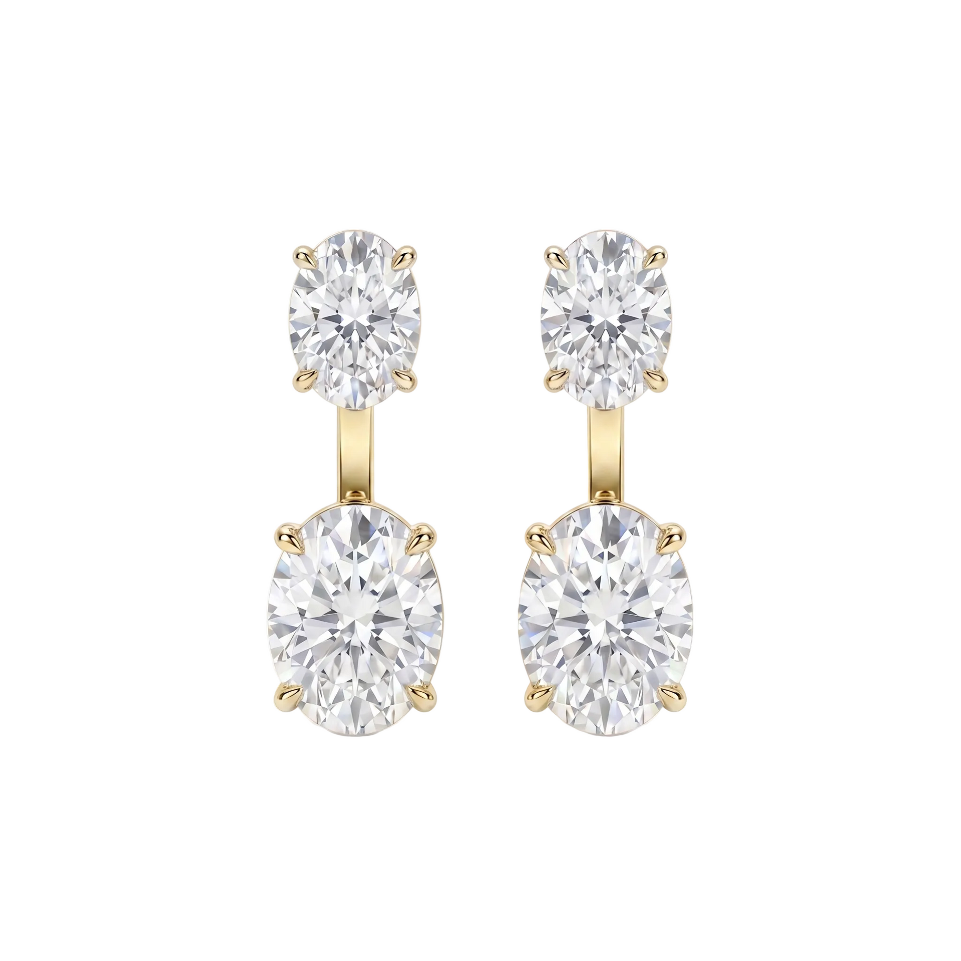 Pair of diamond earrings with gold settings on a white background