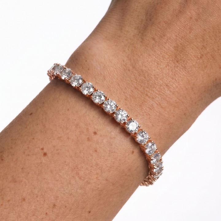 Rose gold 5mm moissanite tennis bracelet on wrist