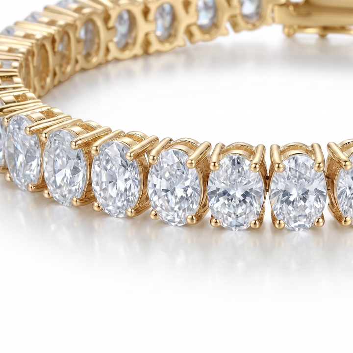 Oval cut moissanite tennis bracelet gold close-up