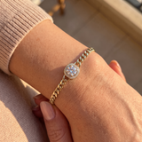 Halo curb-chain bracelet gold styled on wrist