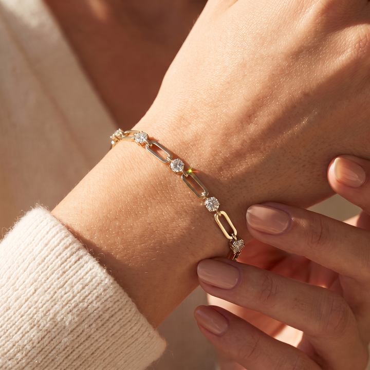 Paperclip station bracelet gold on wrist