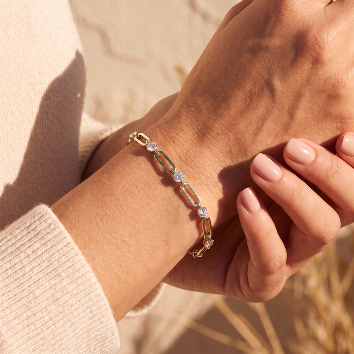 Paperclip station bracelet gold styled on wrist