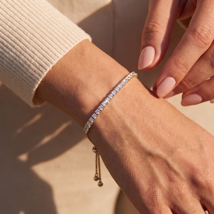 Adjustable bolo tennis bracelet gold on wrist
