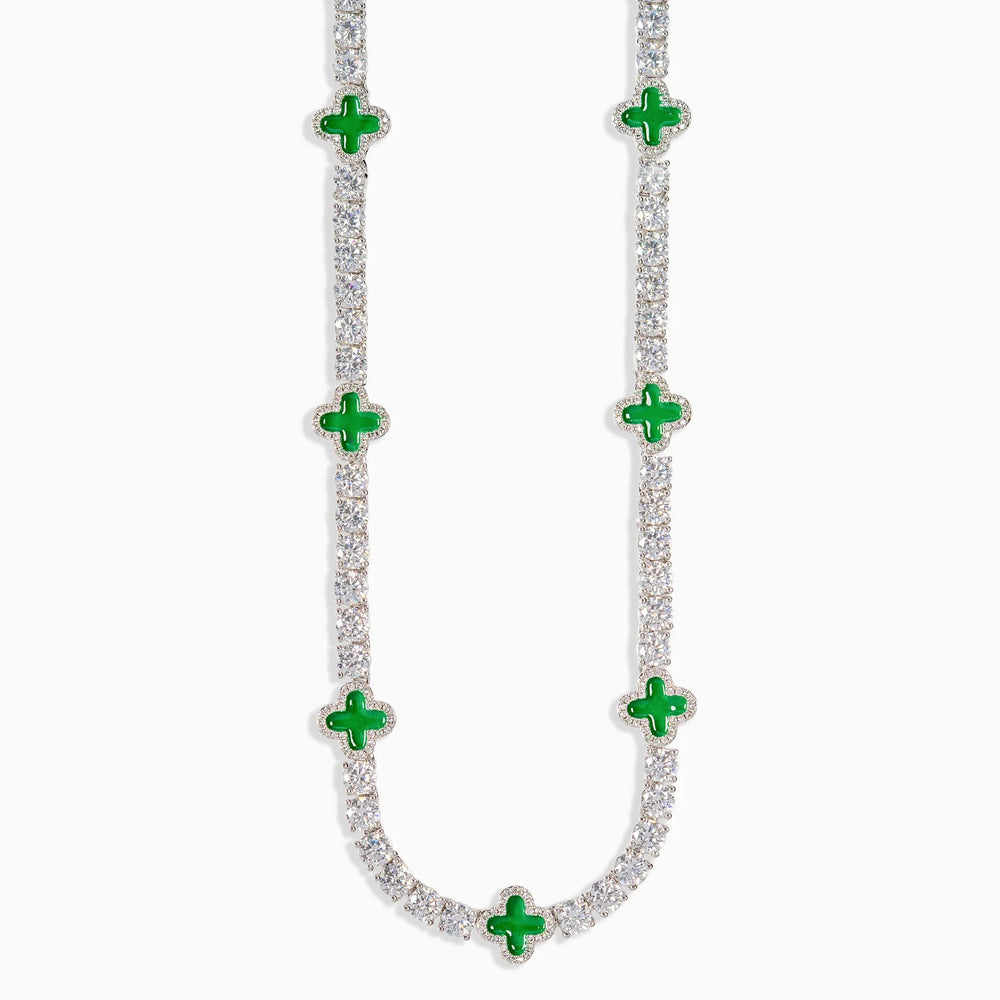 Necklace with green gemstones on a white background
