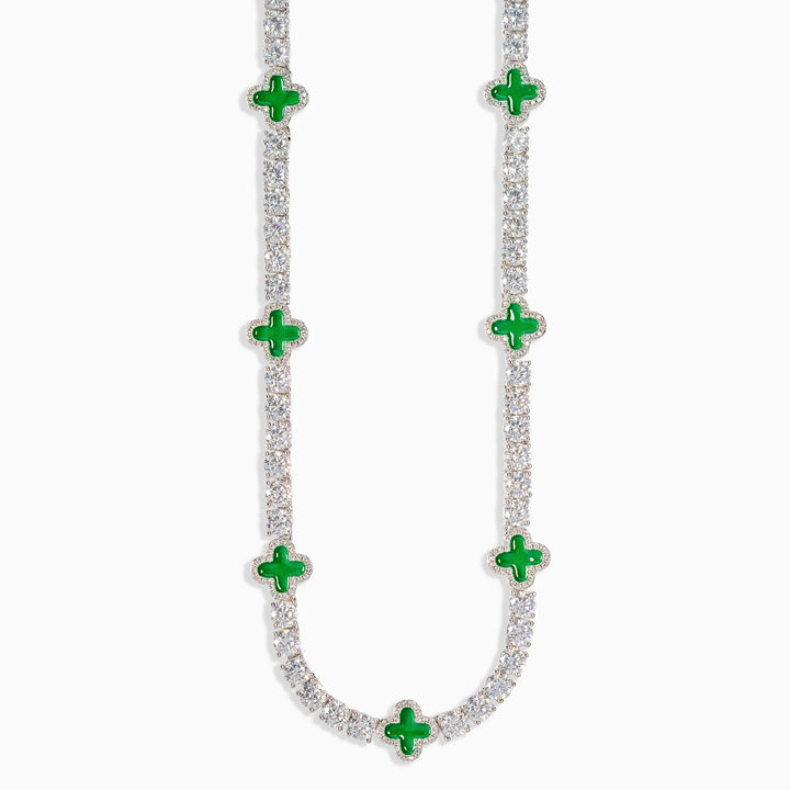Necklace with green gemstones on a white background